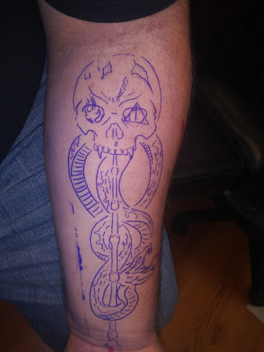 Explore half arm tattoo ideas, creative tattoo ideas in Garden City, available at Talon Tattoo Co