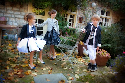 Photos of OTTELIEN COMMUNIEKLEDING EN BRUIDSKLEDING VOOR KINDEREN