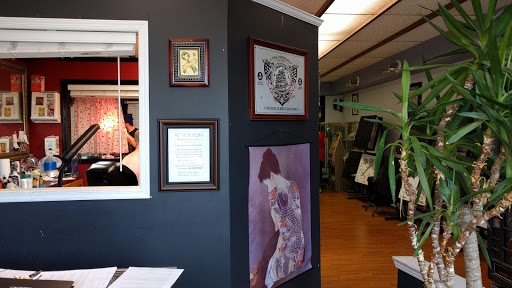 Explore calf tattoo ideas for guys, creative tattoo ideas in Bay Shore, available at House Of Colour Tattoo