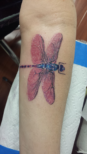 Explore tattoo ideas for hands men, creative tattoo ideas in Chatsworth, available at Howling Winds Tattoo Studio