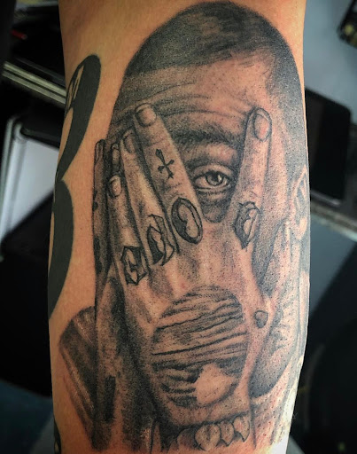 Explore guns n roses tattoo ideas, creative tattoo ideas in Burlington, available at Body Art Tattoo Studio