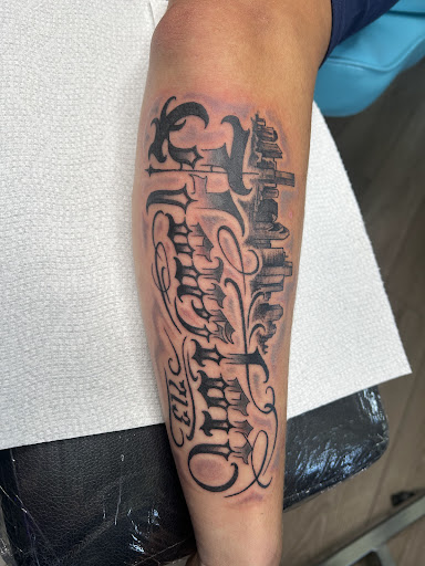 Find flower thigh tattoo ideas for your next unique tattoo in Holly Ridge at Evolution Tattoo Studio