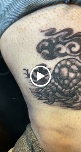 Explore tattoo ideas for men black, creative tattoo ideas in Milford, available at Golden Hammer Tattoo Studios