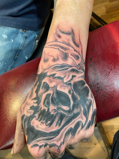 Explore new dad tattoo ideas, creative tattoo ideas in Pikeville, available at The Carbon Canary Tattoo Studio
