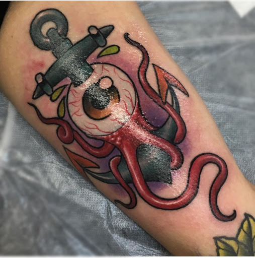 Explore old school tattoo ideas, creative tattoo ideas in Peoria, available at Iron Key Tattoo Studio Inc.