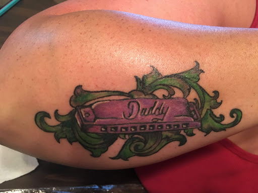 Explore leg tattoo ideas men, creative tattoo ideas in Paris, available at Twizted Dezignz