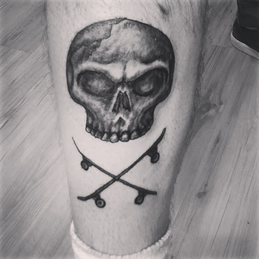 Explore bourbon glass tattoo idea, creative tattoo ideas in Harrisburg, available at Rayzor Tattoos