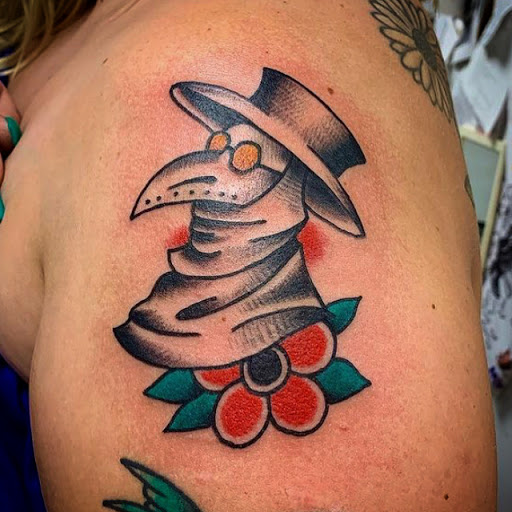 Explore ladies neck tattoo ideas, creative tattoo ideas in Denton, available at Black Anchor Tattoo