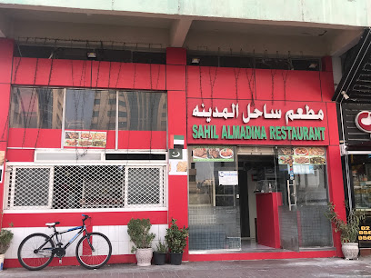 Sahil AL madina Restaurant - Building #716, Airport Road - Al Karamah St - Abu Dhabi - United Arab Emirates