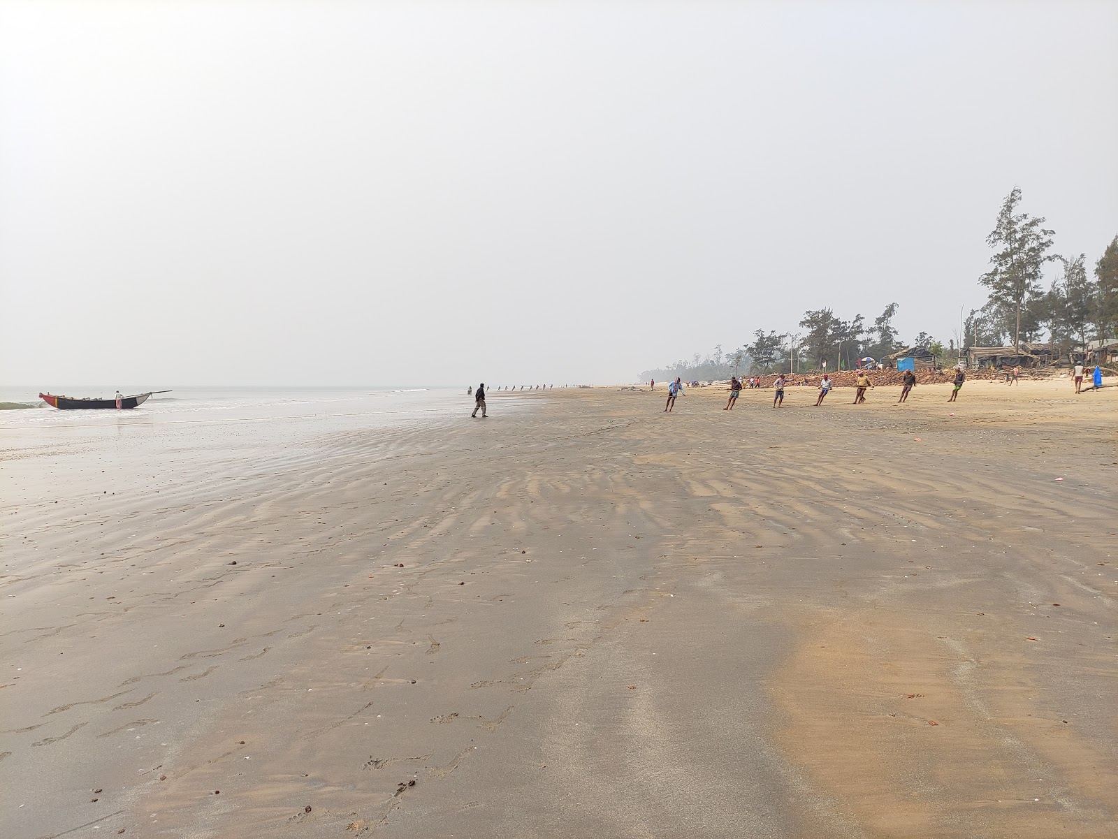 Fotografija Kiagoria Beach z dolga ravna obala