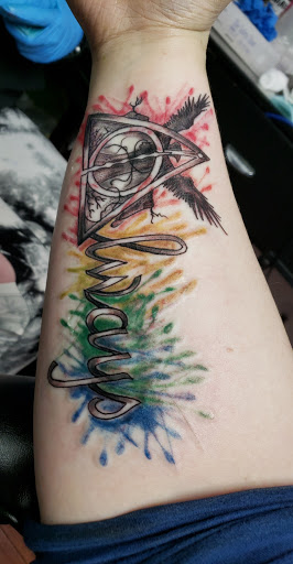 Explore bookish tattoo ideas, creative tattoo ideas in Center Line, available at Elite Ink Tattoo Studios