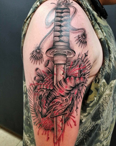 Find surrealism tattoo ideas for your next unique tattoo in Arlington at Urbans Tattoo & Piercing Studio