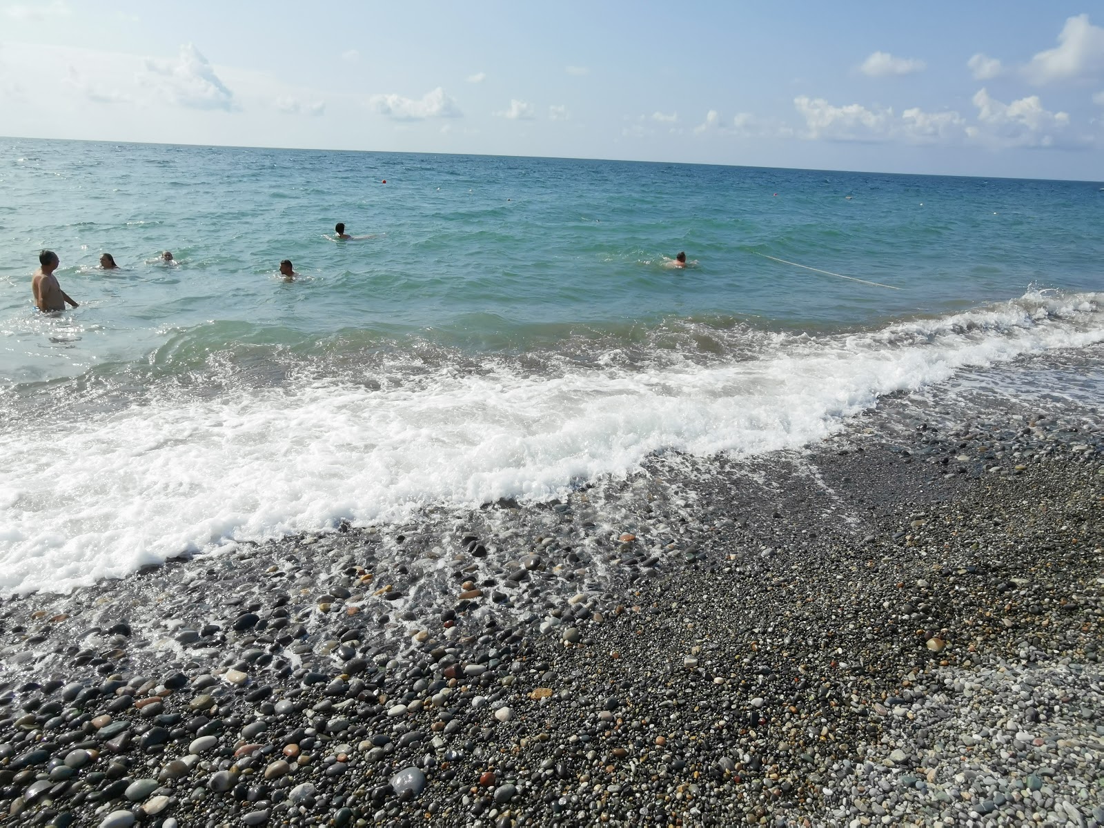 Photo de Gonio beach protégé par des falaises