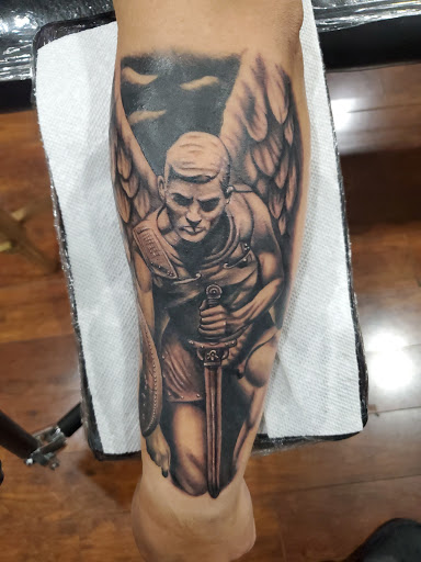 Explore gangsta tattoo sleeve ideas, creative tattoo ideas in Mount Vernon, available at House Of Ink