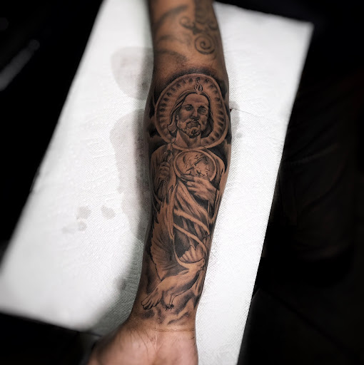 Explore tim burton tattoo sleeve ideas, creative tattoo ideas in Lavonia, available at 1890 Tattoo Co.