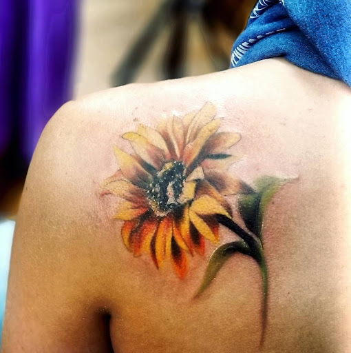 Explore finger tattoo ideas, creative tattoo ideas in Benton, available at Spectrum Tattoo