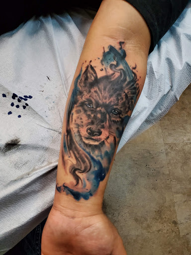 Explore black power tattoo ideas, creative tattoo ideas in Bakersfield, available at CLASSIC STANDARD TATTOO CO.