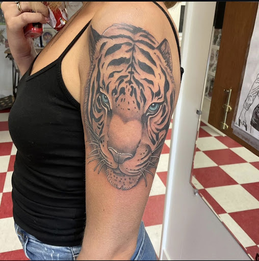 Explore picasso tattoo ideas, creative tattoo ideas in Willow Grove, available at Tattoo GalaxyWillow Grove Piercing & Tattoos