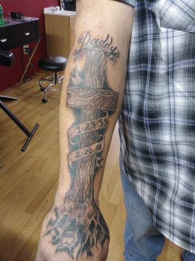 Explore women's half sleeve tattoo ideas, creative tattoo ideas in Florence, available at West Coast Tattoo & Body Piercing