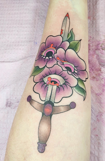 Explore beach tattoo ideas for men, creative tattoo ideas in Athens, available at Pink Goblin Tattoo & Piercing