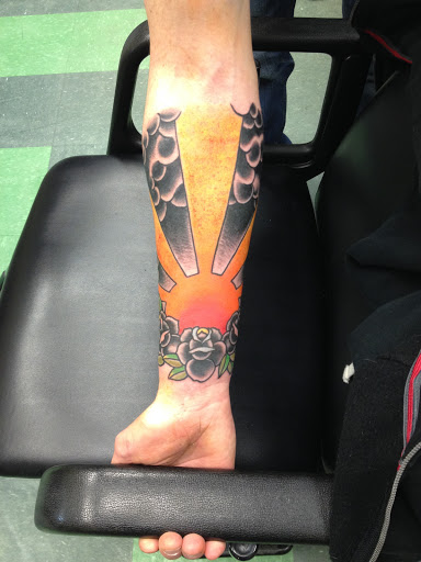 Explore harmonica tattoo ideas, creative tattoo ideas in Brooklyn, available at Electric Lotus Tattoo