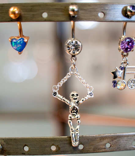 Find tattoo ideas for new moms for your next unique tattoo in Summerville at Exotic Impressions Body Piercing