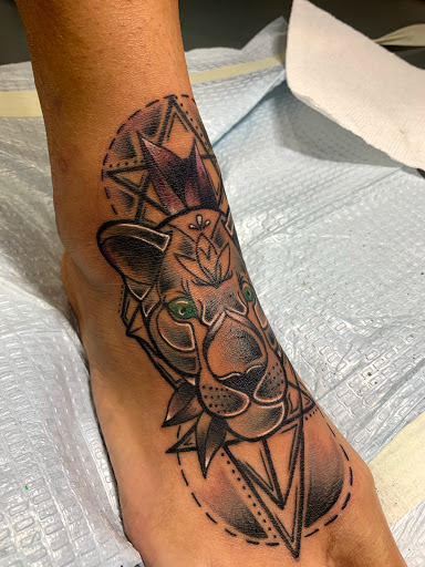 Explore wildlife tattoo ideas, creative tattoo ideas in Cape Coral, available at UNRIVALED INK