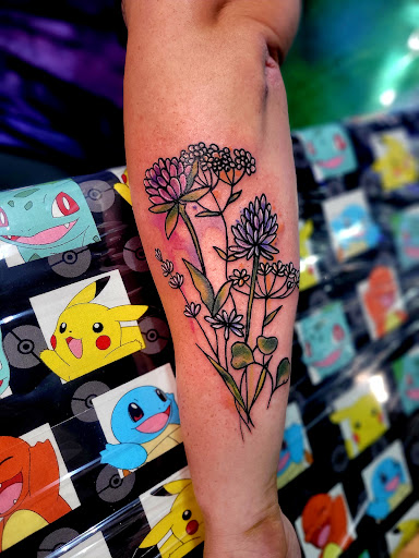 Explore sleeve filler tattoo ideas, creative tattoo ideas in Benton, available at Spectrum Tattoo