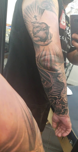 Explore inner ear tattoo ideas, creative tattoo ideas in Des Plaines, available at High Class Studio