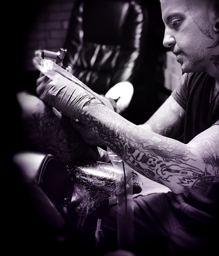 Find boyfriend name tattoo under breast ideas for your next unique tattoo in Myrtle Beach at Elite Ink Tattoos of Myrtle Beach