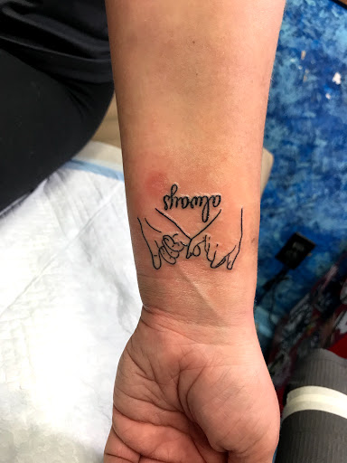 Explore tattoo ideas for ladies back, creative tattoo ideas in Aurora, available at Ronin Tattoo Studio INC