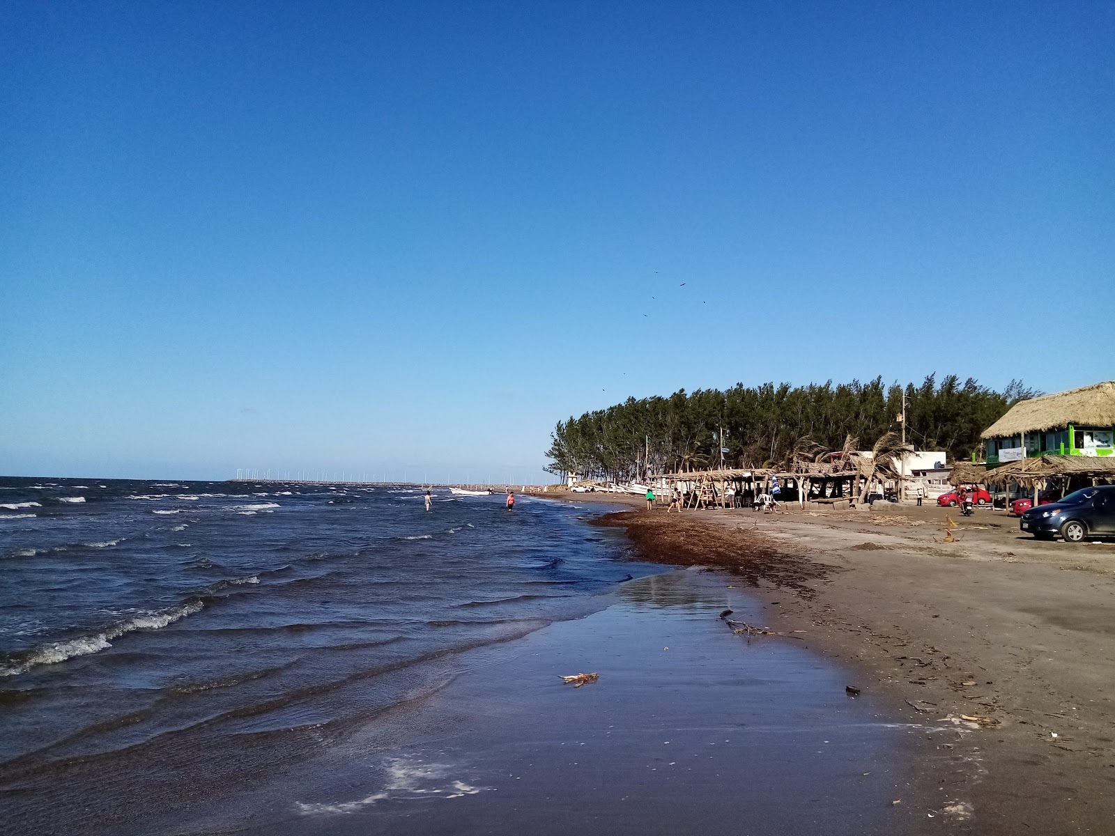 Foto de Playa Anton Lizardo com areia brilhante superfície