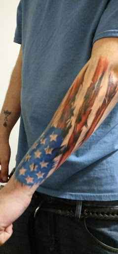 Explore eagle tattoo ideas for men, creative tattoo ideas in Cookeville, available at Roustabout Tattoo And Body Piercing