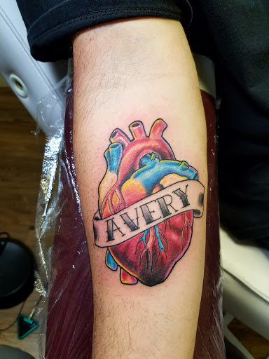 Explore men's side neck tattoo ideas, creative tattoo ideas in Sheridan, available at Beard N Lady Tattoo