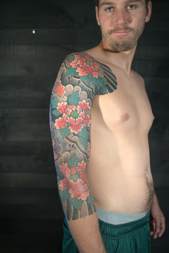 Explore long narrow tattoo ideas, creative tattoo ideas in Albany, available at Dead Presidents Lounge