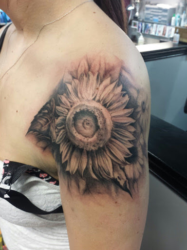 Explore tanning tattoo ideas, creative tattoo ideas in Pottstown, available at Beneath The Skin Tattoo