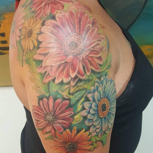 Explore oshun tattoo ideas, creative tattoo ideas in Molalla, available at Back40Tattoo