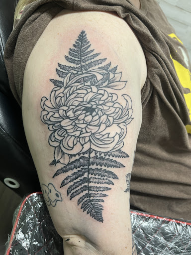 Explore song lyric tattoo ideas, creative tattoo ideas in Gadsden, available at Zekez Inkz Tattoos & Piercings