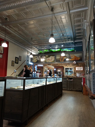 Explore leg flower tattoo ideas, creative tattoo ideas in Northampton, available at Luckys Tattoo and Piercing