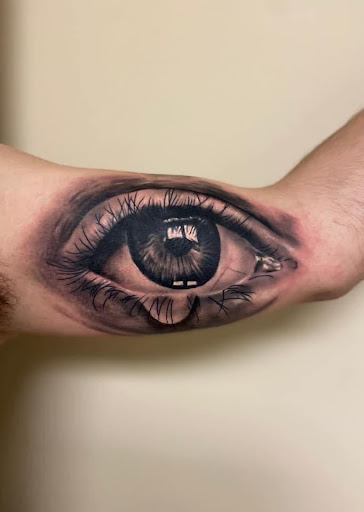 Explore toe ring tattoo ideas, creative tattoo ideas in Sterling Heights, available at Roar Tattoo