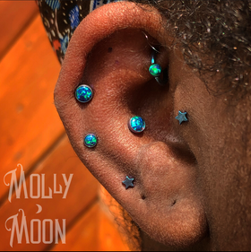 Explore fairy garden tattoo ideas, creative tattoo ideas in Oshkosh, available at Piercings by Molly Moon at 920 Tattoo and Piercing