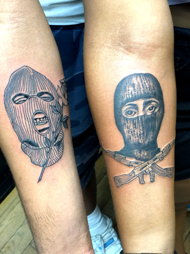 Explore mens religious tattoo ideas, creative tattoo ideas in Jamaica, available at Rising Phoenix Ink