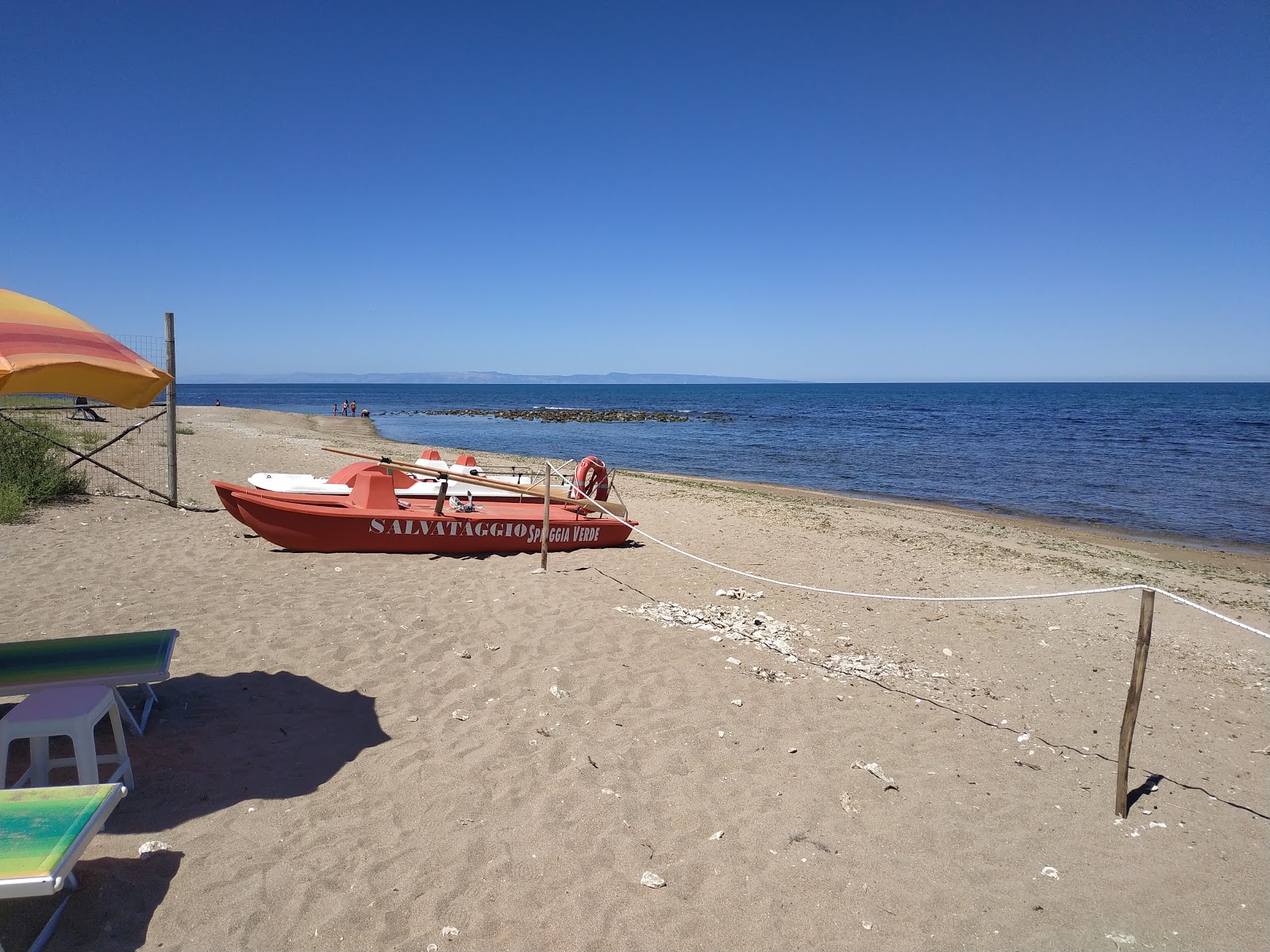Zdjęcie Spiaggia di Ariscianne z powierzchnią beżowy piasek i kamyki