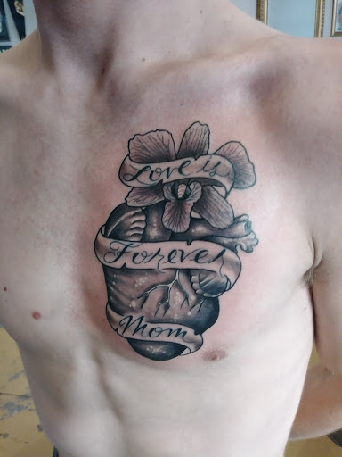 Explore shoulder tattoo ideas male, creative tattoo ideas in Saint Petersburg, available at Foolish Pride Tattoo Co.