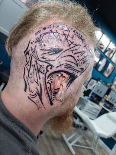 Explore libra tattoo ideas for men, creative tattoo ideas in Buford, available at Wild Tribe Tattoos and Piercings