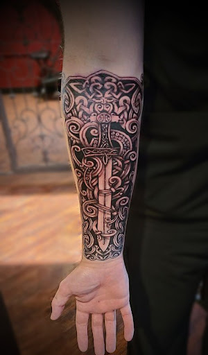 Explore tattoo cover up ideas for men, creative tattoo ideas in Abilene, available at Fear Factor Tattoos and Piercings