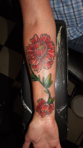 Explore lifeline tattoo ideas, creative tattoo ideas in Tucson, available at Sacred Art Tattoo Studio