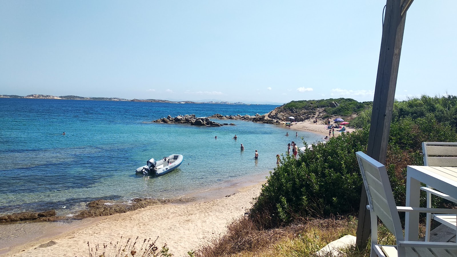 Photo de Plage de Cala longa avec plusieurs baies spacieuses