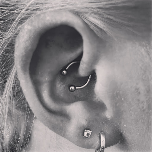 Explore women's tattoo ideas design, creative tattoo ideas in Palm Harbor, available at Angry Owl Tattoo and Piercing