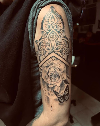 Explore baybayin tattoo ideas, creative tattoo ideas in Lakeville, available at Savage Ink